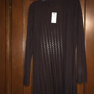 Parallel long brown sweater